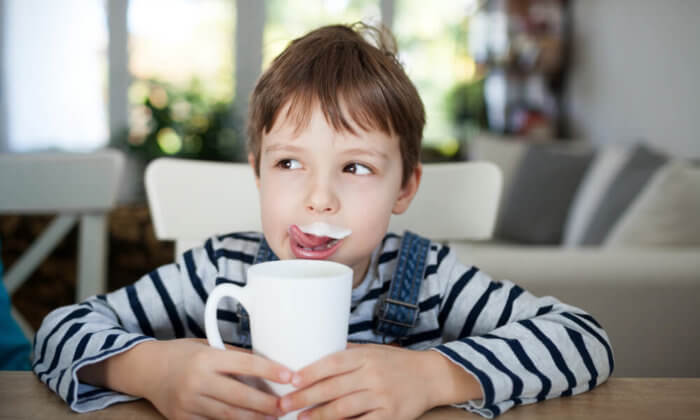 boy drinks milk, does it cause harmful mucus forming